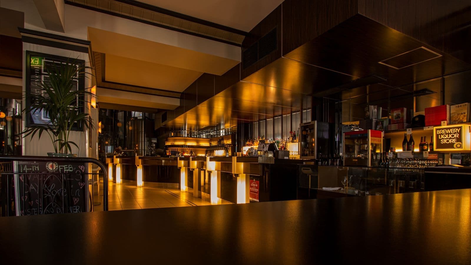 Stock photograph of softly lit bar seating