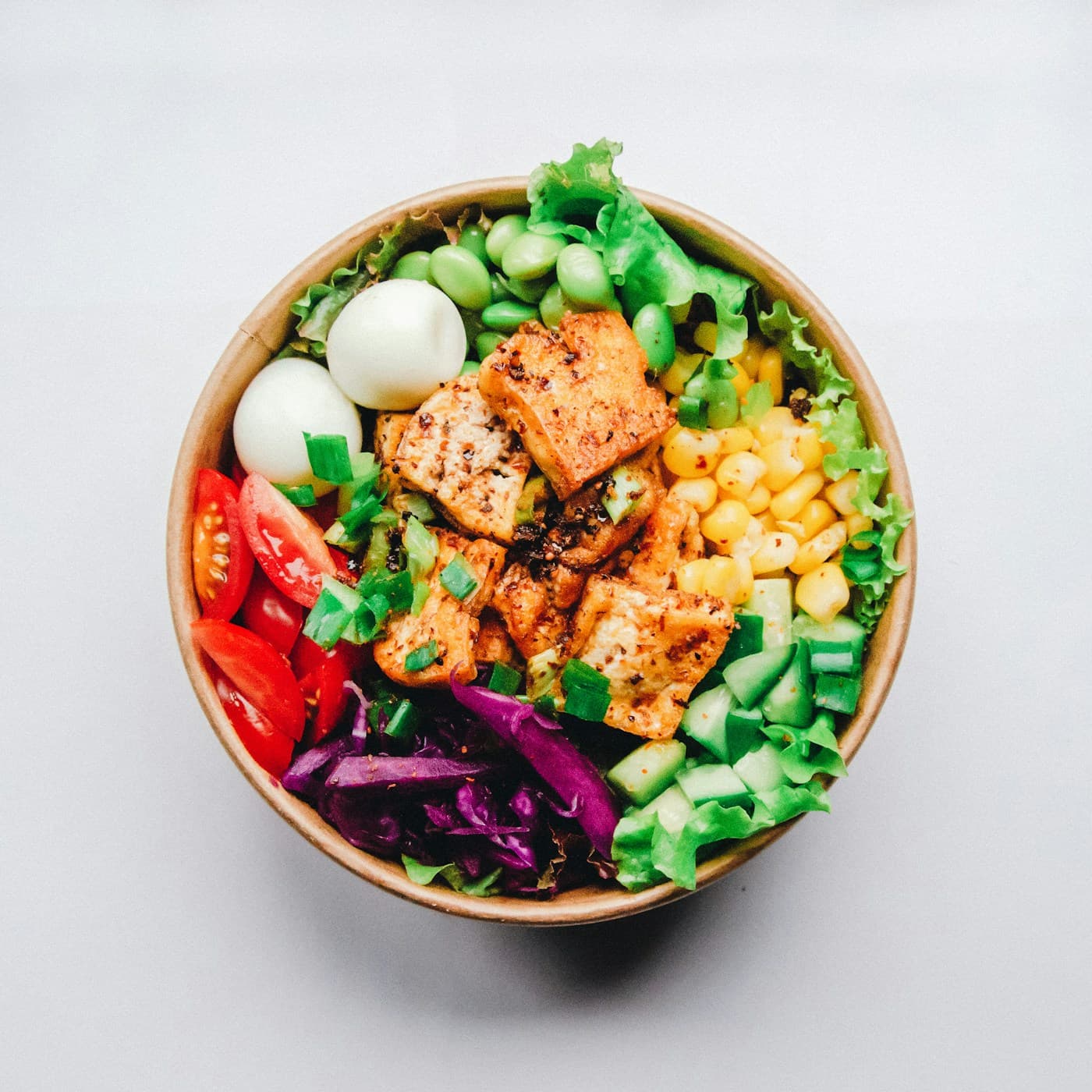 Stock photograph of a colourful bowl of vegetables